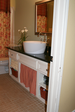 Uba Tuba granite bathroom vanity top in a bathroom remodel