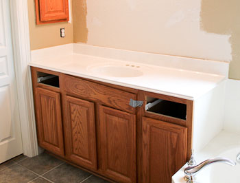 White Cultured Marble Vanity Top with Oak Cabinets