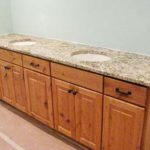 Yellow River Granite on custom pine cabinets