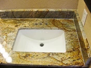 Rectangular Undermount Sink Trench Style in a Bathroom Vanity