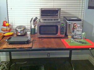 Makeshift kitchen with countertop appliances