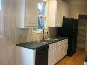 Westlake kitchen with white cabinets - before ornamental granite