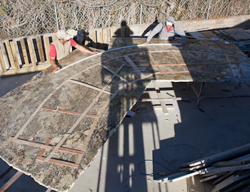 Curved Granite Templates for a Huge Island