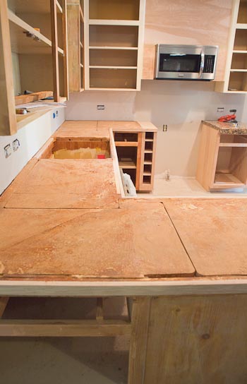 Particleboard subtop on old cabinets.